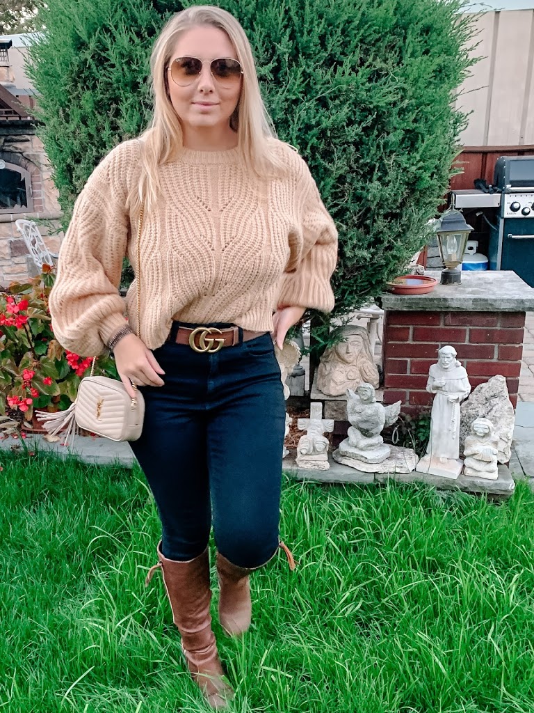 Cute and cozy balloon sleeve sweater styled with black jeans, Gucci belt, and YSL handbag