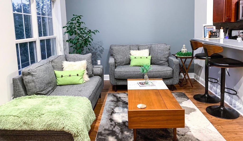 Earthy green home decor theme in the living room