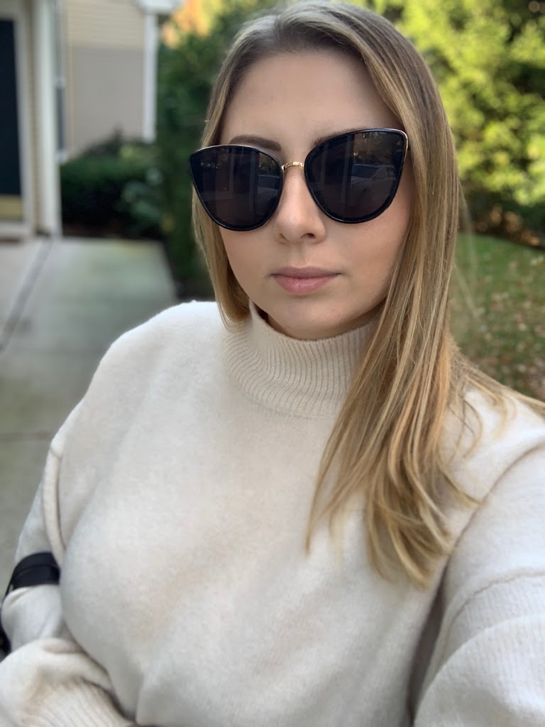 Mock neck sweater and cat-eye sunglasses