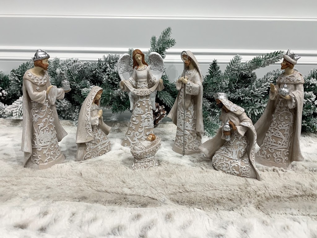 Beautiful Christmas Nativity Set placed on top of the fireplace mantel