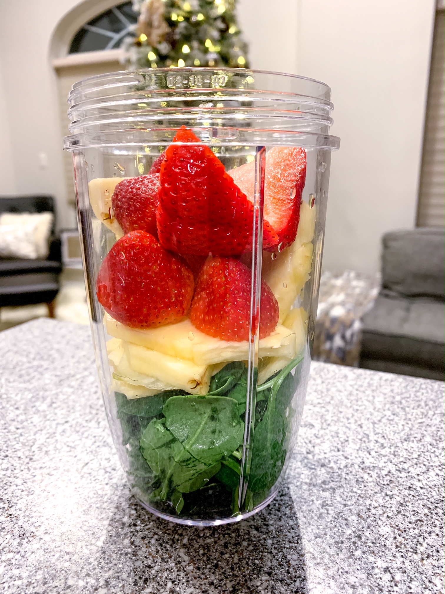 Spinach, Pineapple, Strawberry Smoothie in a NutriBullet 